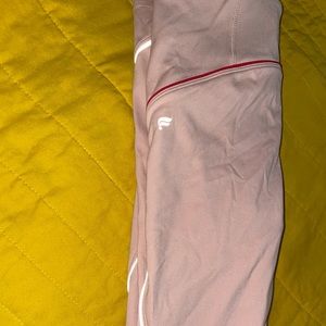 Fabletic leggings that are an XS they are pink with red accents.